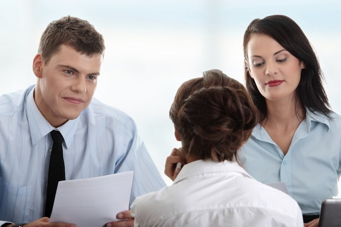 Business-coaching-concept.-Young-woman-being-interviewed-for-a-job..jpg