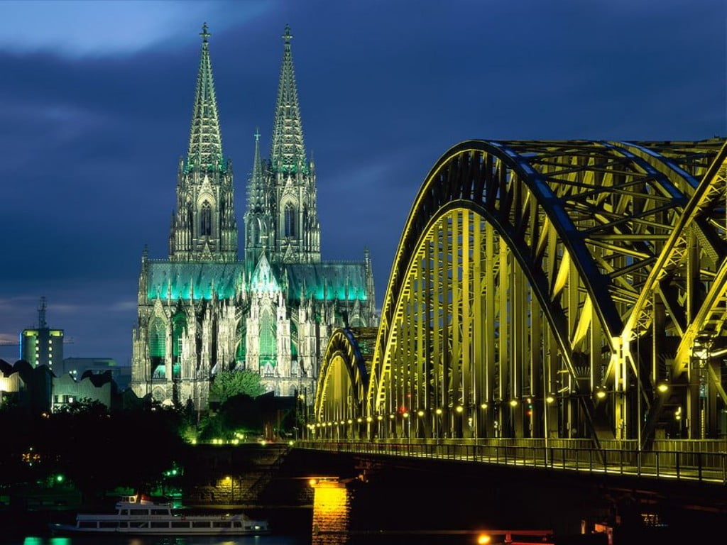 Cologne_Cathedral_And_Hohenzollern_Bridge_Cologne_Germany.jpg