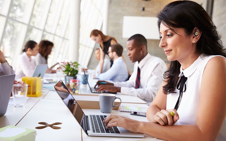 woman-office-work-earbuds.jpg